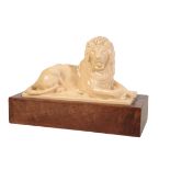 AFTER SIR WILLIAM REID DICK, (1879 – 1961), AN AHSTEAD GLAZED POTTERY MODEL OF A LION,