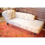 AN EARLY VICTORIAN BUTTON UPHOLSTERED CHAISE LONGUE,