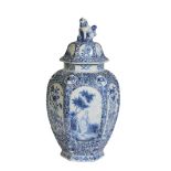 A BLUE AND WHITE DUTCH DELFT WARE VASE AND COVER