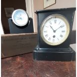 A VICTORIAN POLISHED BLACK SLATE MANTEL TIMEPIECE,