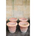 A SET OF FOUR ITALIAN TERRACOTTA GARDEN URNS,