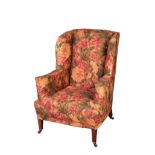 A PAIR OF VICTORIAN UPHOLSTERED WING ARMCHAIRS, BY HOWARD & SONS,