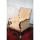 A VICTORIAN UPHOLSTERED ARMCHAIR,
