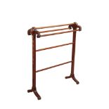 A VICTORIAN CARVED MAHOGANY TOWEL HORSE, IN NEOCLASSICAL TASTE,