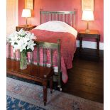 A BRASS AND BRONZE MOUNTED DOUBLE BED, IN NEOCLASSICAL TASTE,