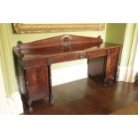 A REGENCY MAHOGANY SIDEBOARD,