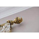 A SUBSTANTIAL BRASS CURTAIN RAIL,