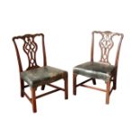 A PAIR OF GEORGE III MAHOGANY AND LEATHER UPHOLSTERED SIDE CHAIRS,