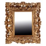 A BOLOGNESE CARVED AND GILTWOOD FRAMED RECTANGULAR WALL MIRROR,