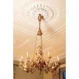 AN IMPORTANT EMPIRE GILTWOOD AND GILT METAL CHANDELIER