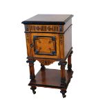 A VICTORIAN AMBOYNA AND EBONISED POT CUPBOARD, IN AESTHETIC STYLE, PROBABLY BY LAMB OF...