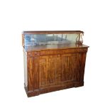 A REGENCY MAHOGANY INVERTED BREAKFRONT SIDE CABINET,