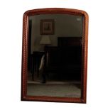 A LATE VICTORIAN OR EDWARDIAN STAINED OAK FRAMED WALL MIRROR,