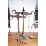 A SET OF BRASS, CAST AND WROUGHT IRON WEIGHING SCALES,