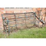 A VICTORIAN WROUGHT IRON GARDEN BENCH,