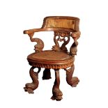 A RARE WILLIAM IV CARVED OAK LIBRARY ELBOW CHAIR OR READING CHAIR, POSSIBLY BY JOHNSTONE, JUPE...