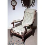 A REGENCY MAHOGANY LIBRARY ARMCHAIR,