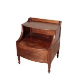 A GEORGE III MAHOGANY BOWFRONT LANCASHIRE COMMODE, ATTRIBUTABLE TO GILLOWS,