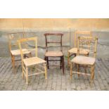 TWO SIMILAR REGENCY PAINTED WOOD AND RUSH SEATED SIDE CHAIRS,