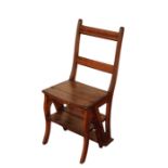 A VICTORIAN OAK METAMORPHIC LIBRARY CHAIR /STEPS,