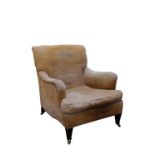 A VICTORIAN UPHOLSTERED ARMCHAIR, IN THE MANNER OF HOWARD & SONS,