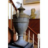 A GEORGE III CAST IRON STOVE IN THE FORM OF A CLASSICAL URN, ATTRIBUTED TO THE CARRON IRON CO,