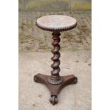 A ROSEWOOD AND MAHOGANY GUERIDON STAND,
