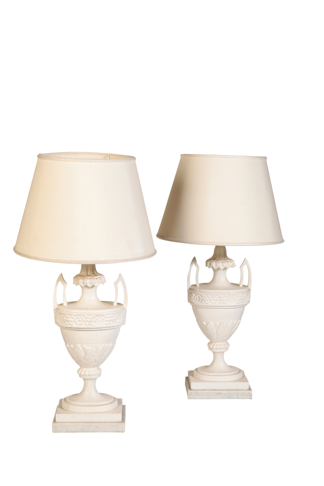 A PAIR OF PAINTED WOOD AND COMPOSITION TABLE LAMPS MODELLED AS TWIN HANDLED URNS,