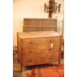 AN OAK CHEST OF DRAWERS, BY HEAL & SON LTD.,