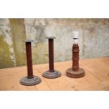 A PAIR OF EARLY VICTORIAN MAHOGANY AND METAL-MOUNTED CANDLESTICKS,