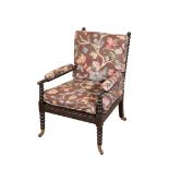 A VICTORIAN EBONISED AND BOBBIN TURNED ARMCHAIR, BY GILLOWS,