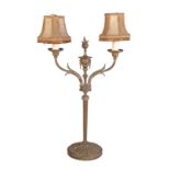 A BRASS TWIN LIGHT TABLE LAMP IN NEOCLASSICAL STYLE,