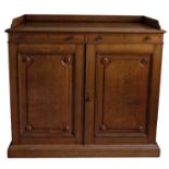 A REGENCY OAK SIDE CABINET, ATTRIBUTABLE TO GILLOWS,