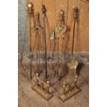 A SET OF THREE VICTORIAN BRASS FIRE TOOLS,