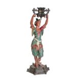 A CONTINENTAL COLD PAINTED SPELTER FIGURAL CANDLEHOLDER,