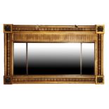 A REGENCY OR GEORGE IV GILTWOOD FRAMED OVERMANTEL MIRROR,