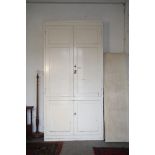 A SUBSTANTIAL VICTORIAN WHITE PAINTED PINE HOUSEKEEPER'S CUPBOARD,