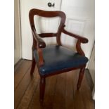 A REGENCY MAHOGANY LIBRARY ELBOW CHAIR, IN THE MANNER OF GILLOWS,
