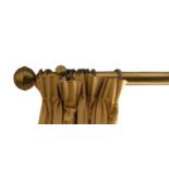 A GILT BRASS CURTAIN RAIL,