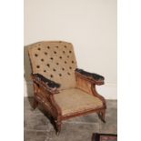 A VICTORIAN OAK AND UPHOLSTERED LIBRARY ARMCHAIR, BY HOLLAND & SONS,