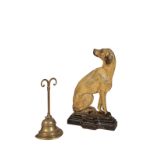 A VICTORIAN PAINTED IRON DOOR PORTER CAST AS A SEATED HOUND,
