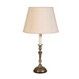 AN EMPIRE ORMOLU CANDLESTICK LATER FITTED AS A TABLE LAMP,