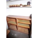 AN OAK OPEN BOOKCASE,