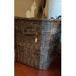 A LARGE RECTANGULAR WICKER LOG BASKET,