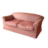AN UPHOLSTERED SOFA, BY HOWARD & SONS,