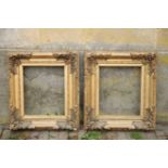 A PAIR OF GILTWOOD AND COMPOSITION PICTURE FRAMES IN 18TH CENTURY STYLE,