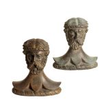 A PAIR OF BRONZE BUSTS CAST AS JANUS, POSSIBLY DECK MOORING CLEATS,