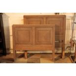 A PAIR OF OAK SINGLE BEDS, IN AESTHETIC STYLE,