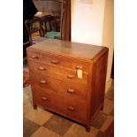 AN ARTS AND CRAFTS OAK CHEST OF DRAWERS,