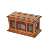 A VICTORIAN OAK AND GLAZED DOMESTIC POSTING BOX, IN GOTHIC REVIVAL TASTE,